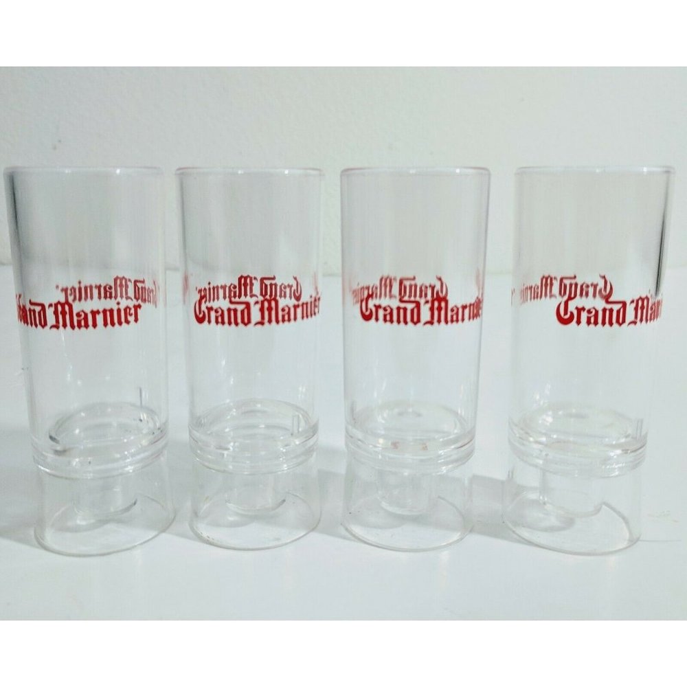 Grand Marnier branded cordial liquor 4 plastic shot glasses